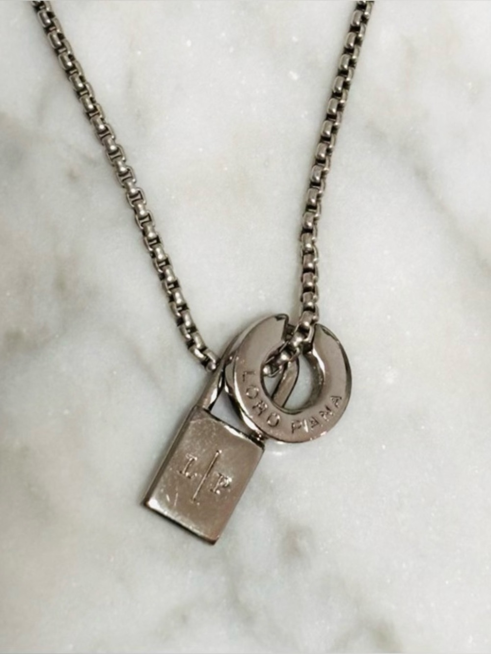 LORO PIANA Circle & Lock Pendant Silver Tone
